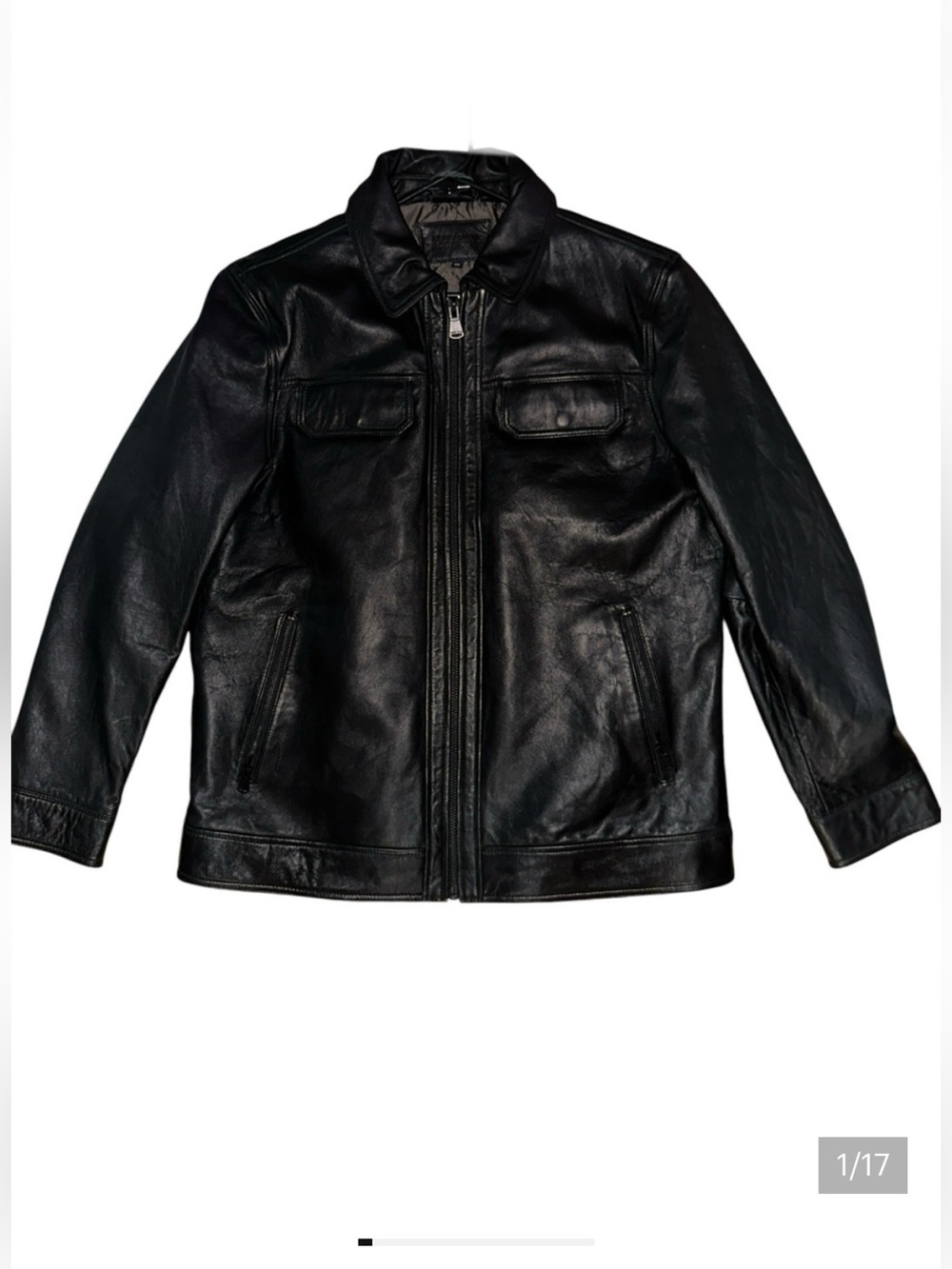 Perry Ellis Portfolio black leather jacket featuring a quilted interior lining